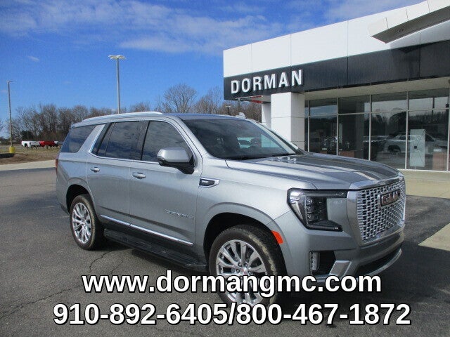 2024 GMC Yukon Denali in Sterling Metallic — front three-quarter view