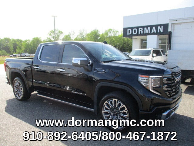 2023 GMC Sierra 1500 Denali Ultimate in Onyx Black — front three-quarter view